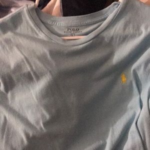 A light blue and yellow polo tee shirt